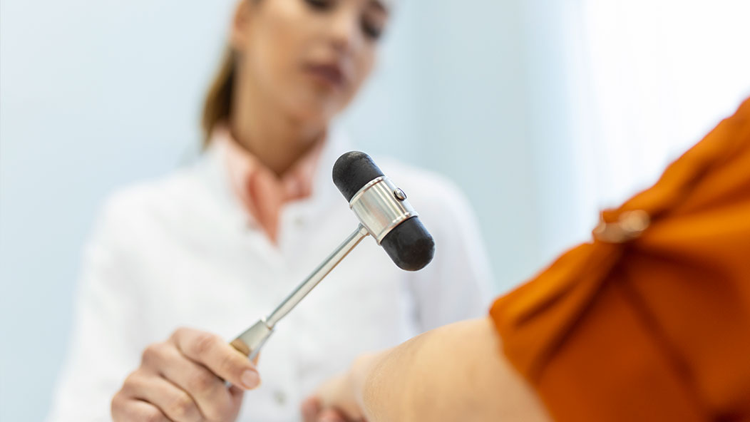 reflex hammer testing on patient