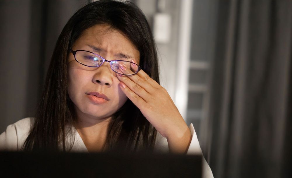 Woman Scratching Eye