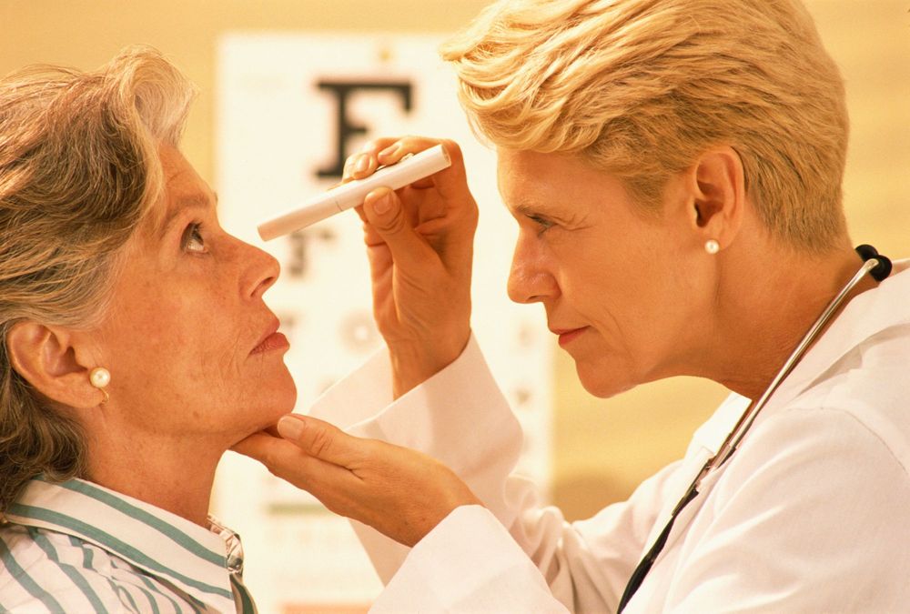 Woman getting an eye exam